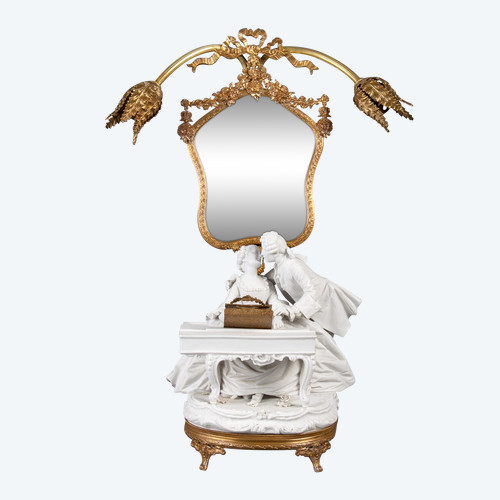 A romantic group in biscuit mounted lamp late 19th century