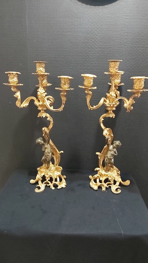 Pair of Louis XV style gilt bronze candlesticks