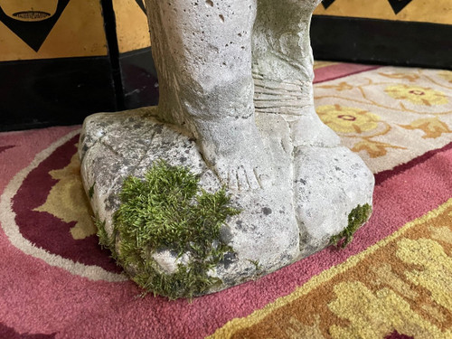 Stone child garden statue