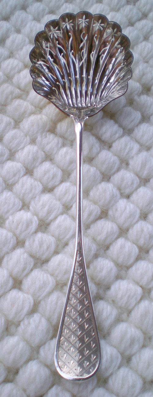 Napoleon III 19th century sprinkling spoon in solid silver, neck brace hallmark