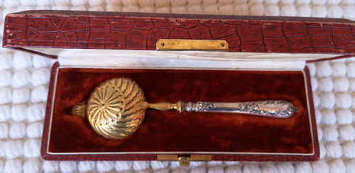 Box: lovely silver-filled sprinkling spoon and golden spoon