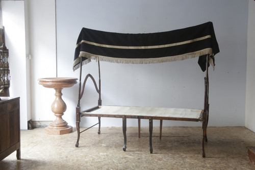 Foldable camp bed in rosewood and marquetry, 18th century.