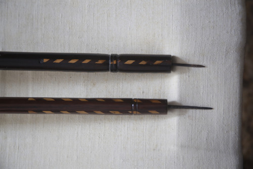 Foldable camp bed in rosewood and marquetry, 18th century.