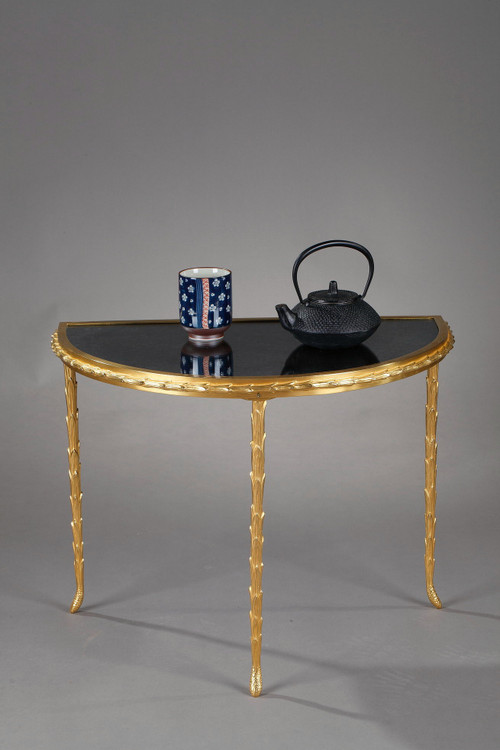 Small half moon table with aged mirror top in bronze, Maison Baguès