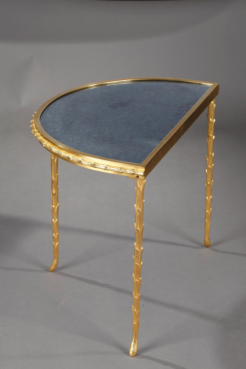 Small half moon table with aged mirror top in bronze, Maison Baguès