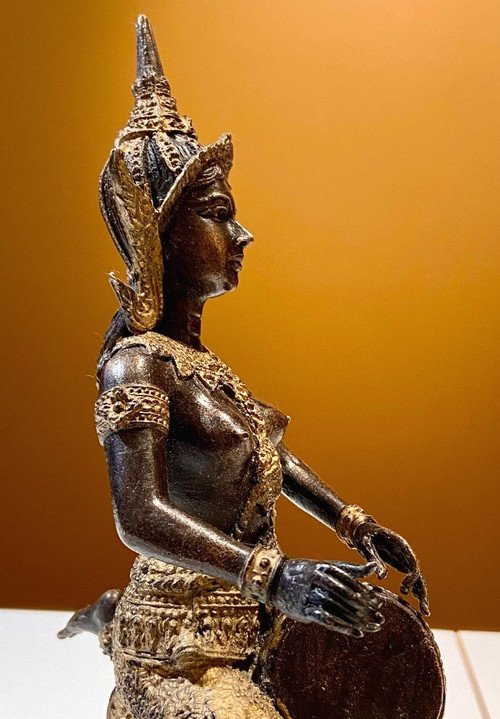 Thailand, Mid-20th Century, Bronze Musician Statue With Dark And Gold Patina.