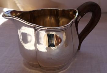 Art deco tea service in solid silver, punch neck brace Goldsmith Fouquet-Lapar