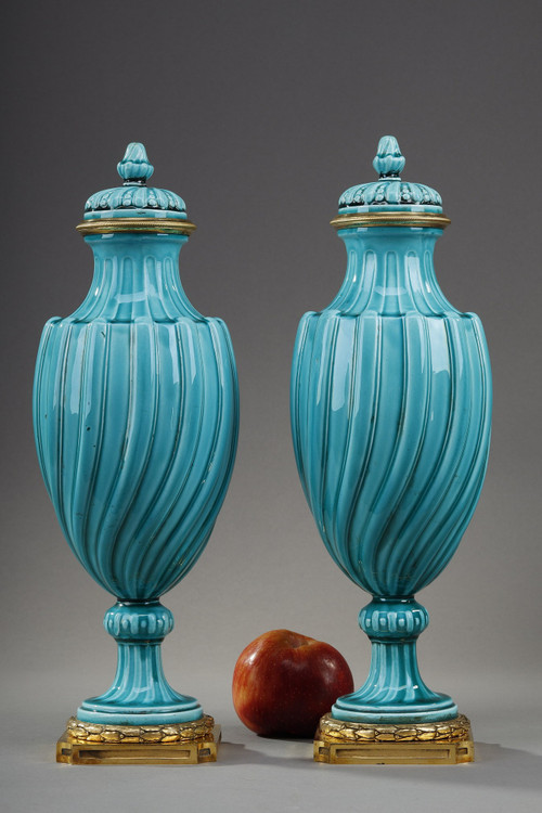 Pair of Louis XVI style covered vases in ceramic 