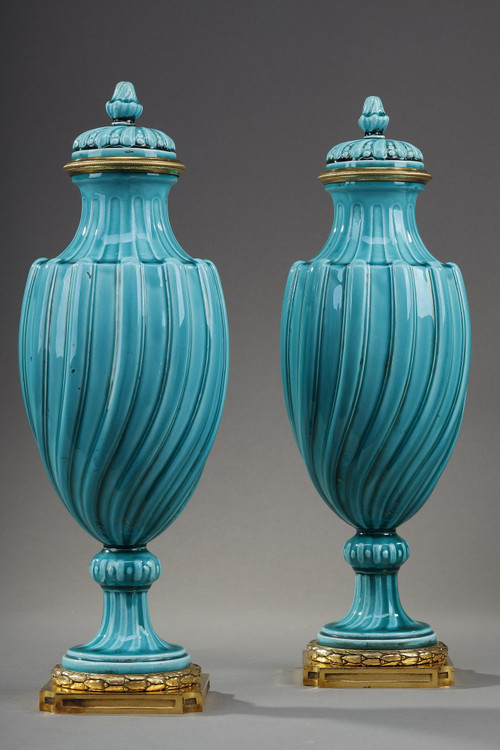 Pair of Louis XVI style covered vases in ceramic 