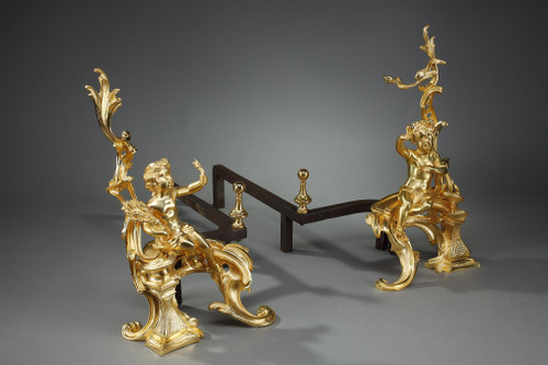 PAIR OF GILDED ANDIRONS IN THE LOUIS XV STYLE BRONZE