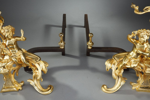 PAIR OF GILDED ANDIRONS IN THE LOUIS XV STYLE BRONZE