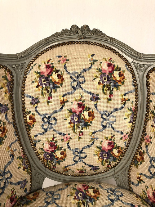 Pair of Louis XVI style wing chairs in gray lacquered wood. Late 19th century