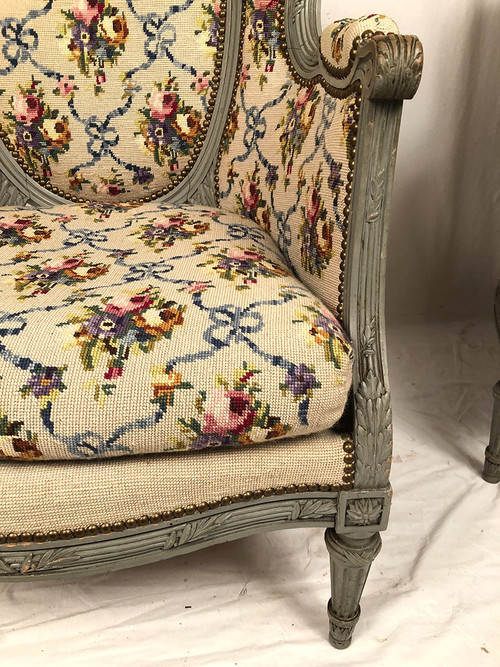 Pair of Louis XVI style wing chairs in gray lacquered wood. Late 19th century