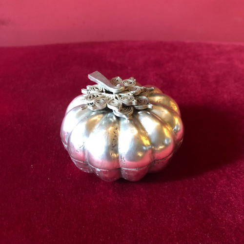 Two foreign silver pumpkins