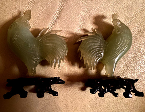 Very beautiful pair of almond green jade roosters on precious carved openwork Chinese wood base