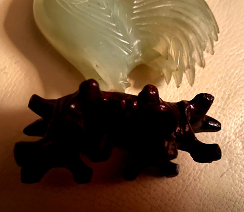 Very beautiful pair of almond green jade roosters on precious carved openwork Chinese wood base