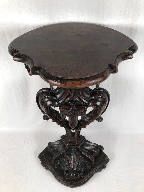 Richly carved walnut sellette, 18th century