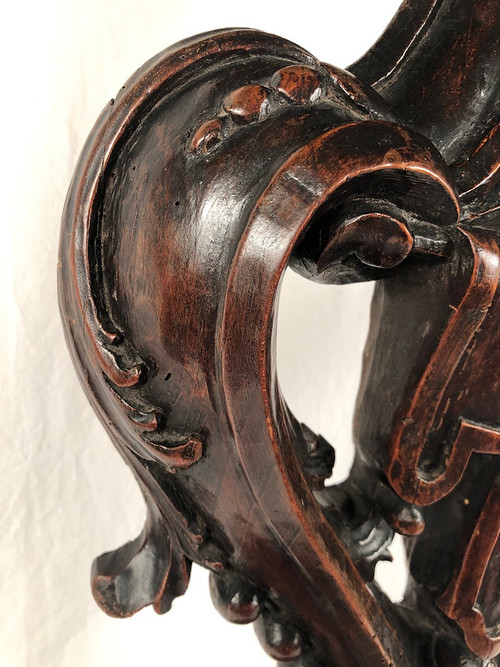 Richly carved walnut sellette, 18th century