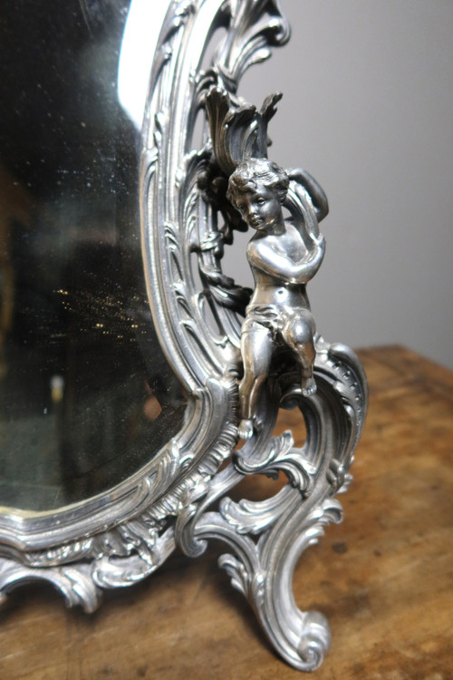 Table mirror with cherubs