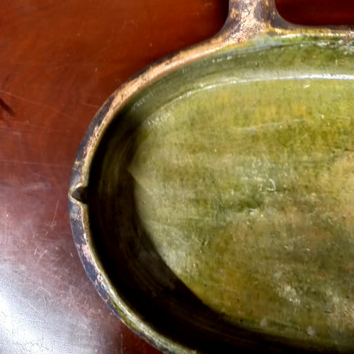 19th century glazed green terracotta drip pan