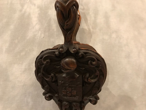 Old fireplace bellows in carved wood from the 19th century