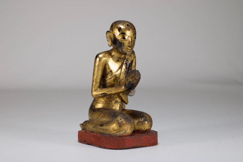 Burmese worshiper in gilded wood.