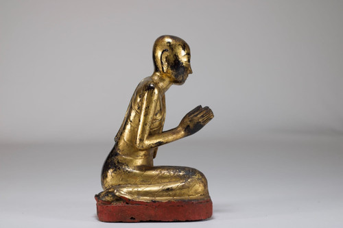 Burmese worshiper in gilded wood.