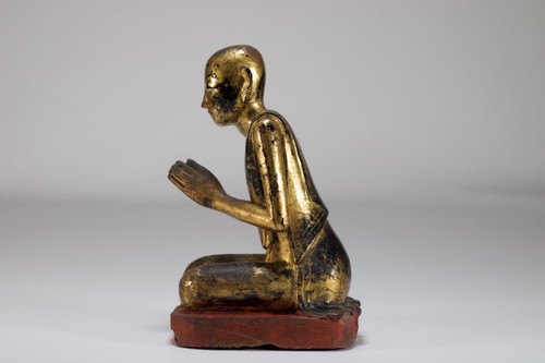 Burmese worshiper in gilded wood.