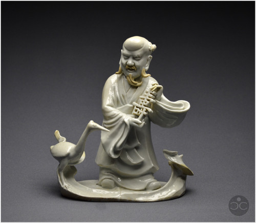 China, 18th century, Chinese white porcelain group depicting the Taoist god Shoulao