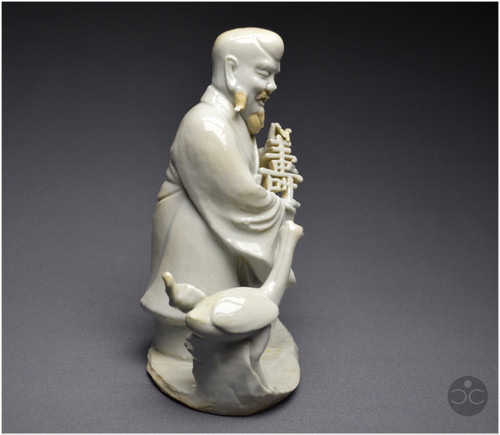 China, 18th century, Chinese white porcelain group depicting the Taoist god Shoulao