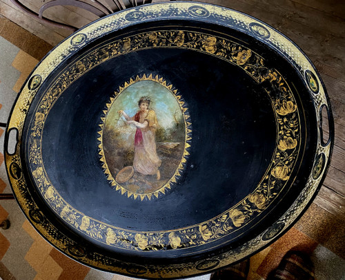 Exceptional large Napoleon III tray, oval painted sheet metal, decorated with gilded friezes and a painted scene.