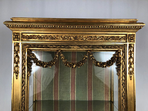 Louis XVI-style gilded stucco and wood display case, circa 1900