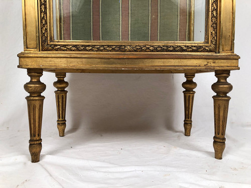 Louis XVI-style gilded stucco and wood display case, circa 1900