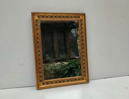 Rectangular mirror in gilded wood.