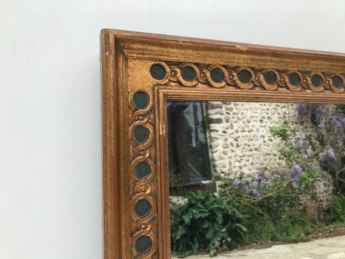 Rectangular mirror in gilded wood.