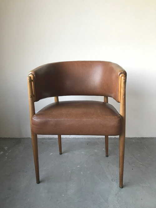 Brown leatherette armchair circa 1950.