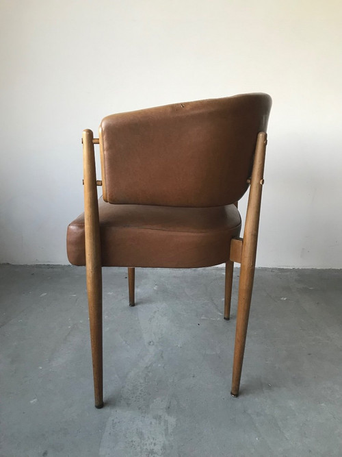 Brown leatherette armchair circa 1950.