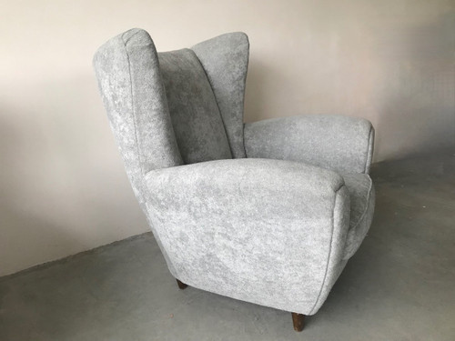 Pair of Italian armchairs in the style of Jean Royère in pearl gray velvet.