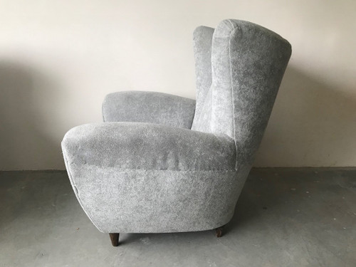 Pair of Italian armchairs in the style of Jean Royère in pearl gray velvet.