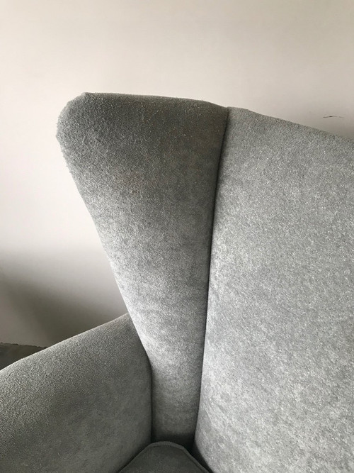 Pair of Italian armchairs in the style of Jean Royère in pearl gray velvet.