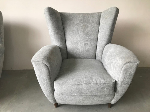 Pair of Italian armchairs in the style of Jean Royère in pearl gray velvet.