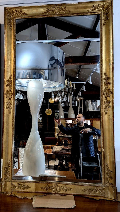 Large Restoration Mirror In Gilded Stucco With Gold Leaf