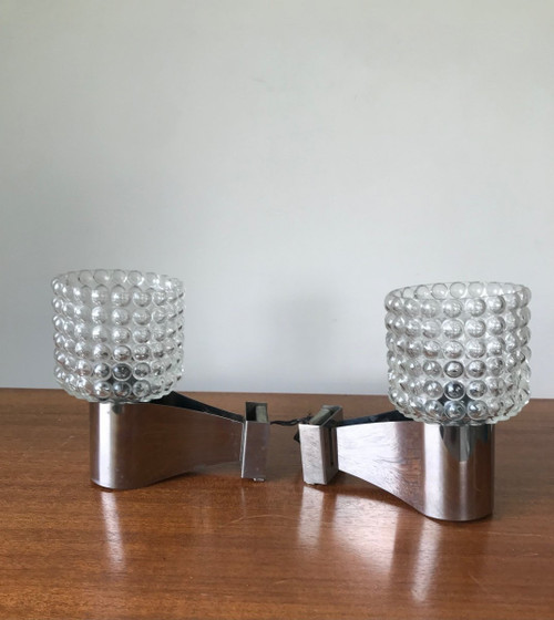 Pair of chrome and glass sconces, circa 1970.