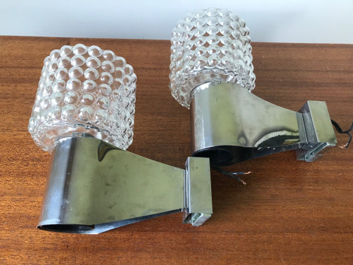 Pair of chrome and glass sconces, circa 1970.