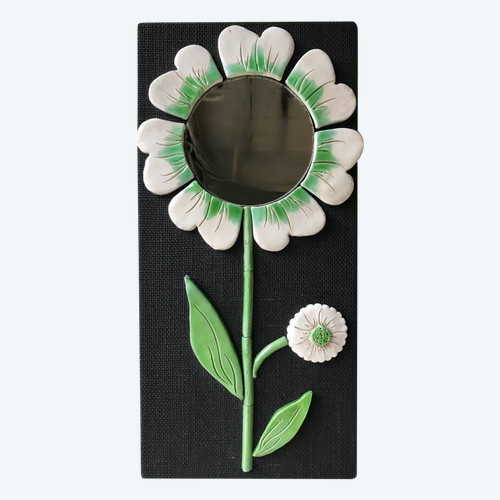 Ceramic flower mirror.