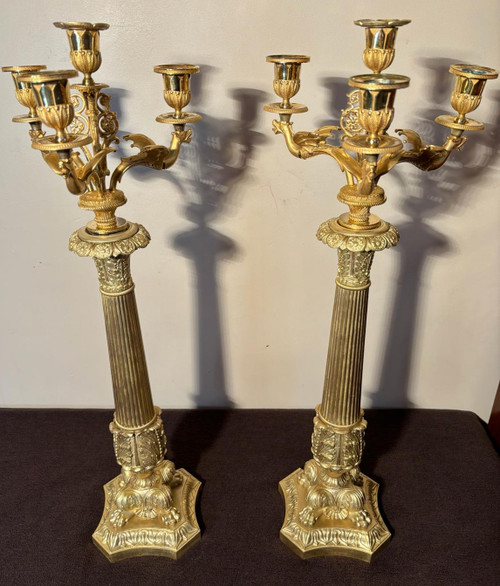 Large pair of candelabra (Flambeaux) in gilded bronze from the beginning of the 19th century.