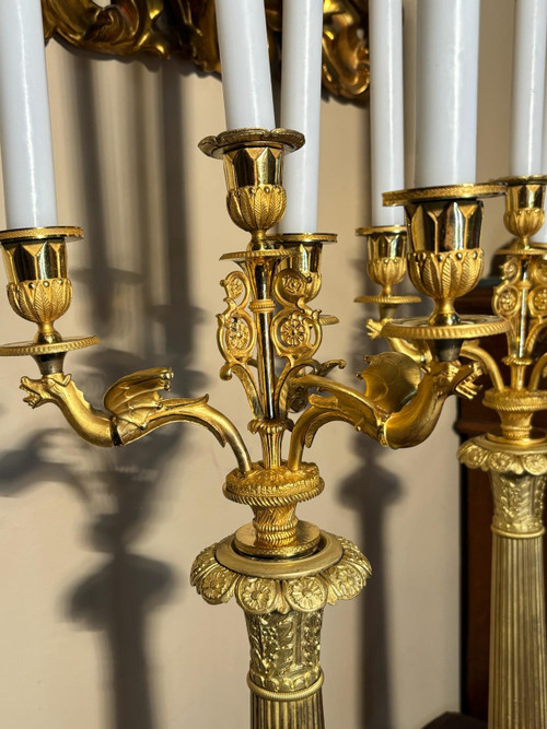 Large pair of candelabra (Flambeaux) in gilded bronze from the beginning of the 19th century.