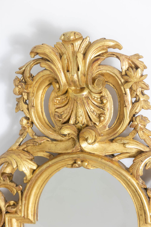 Regency style mirror in carved and gilded wood. 1950s.