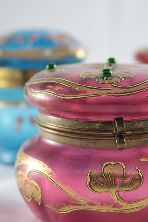 Pink glass box decorated with enamel, gilding and cabochons circa 1900