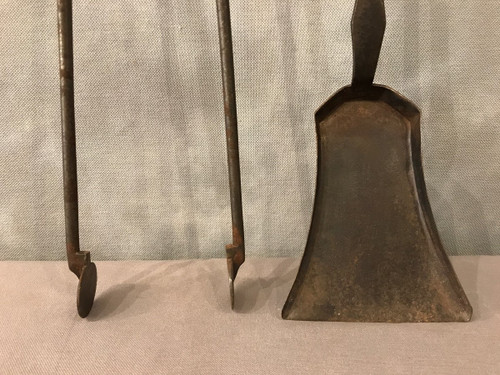 Set of an iron and bronze shovel and tongs, 19th century